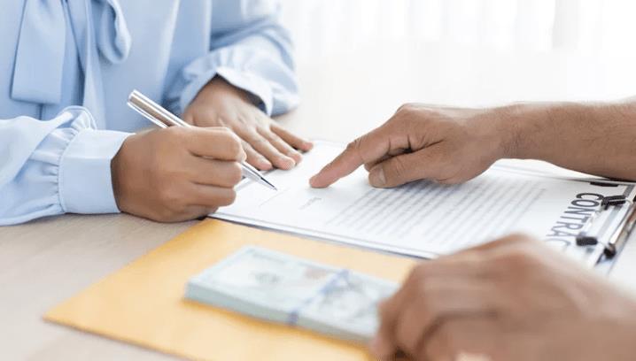 two hands working with SBA collateral requirements 